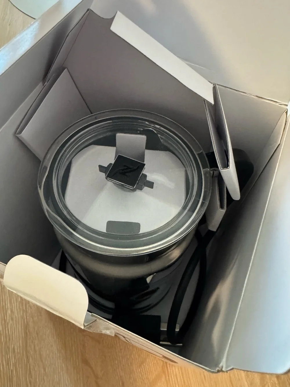 Nespresso froths milk